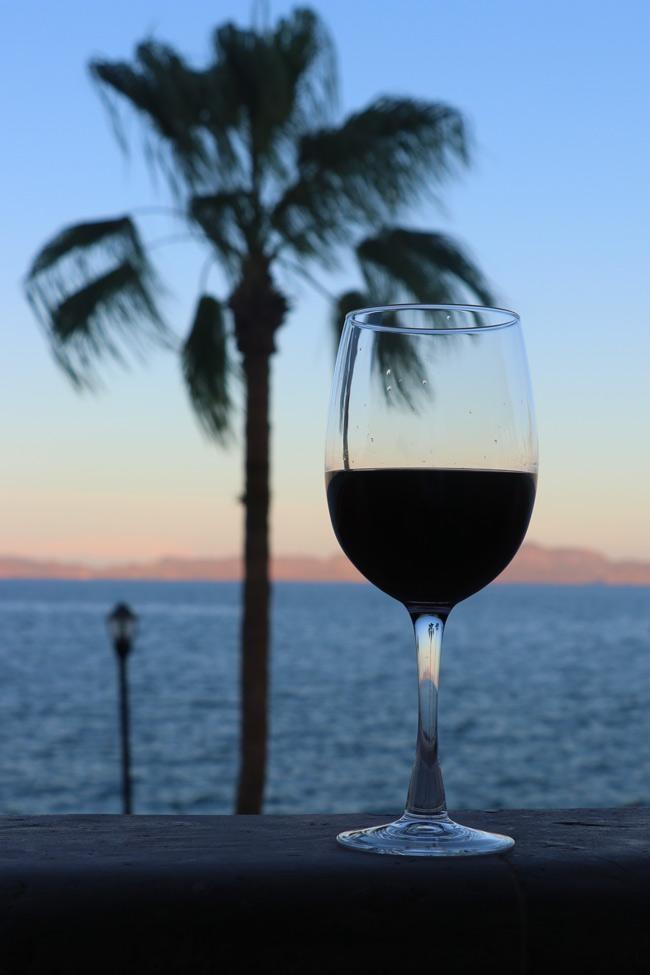 wine glass at sunset at la mision hotel loreto mexico
