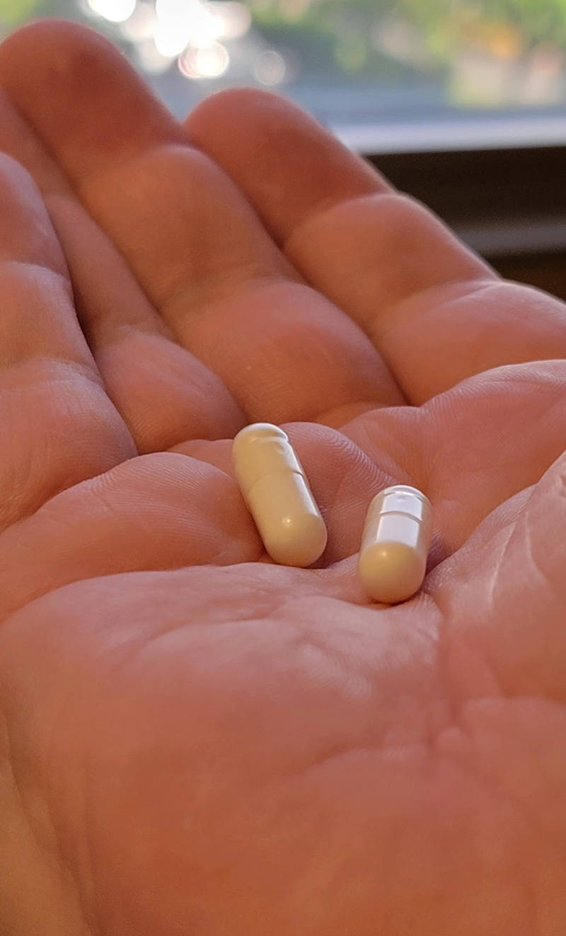 magnesium supplements in hand