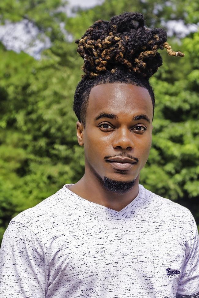 dreadlocks man bun hairstyle
