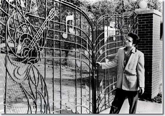 elvis at gates of graceland in 1957