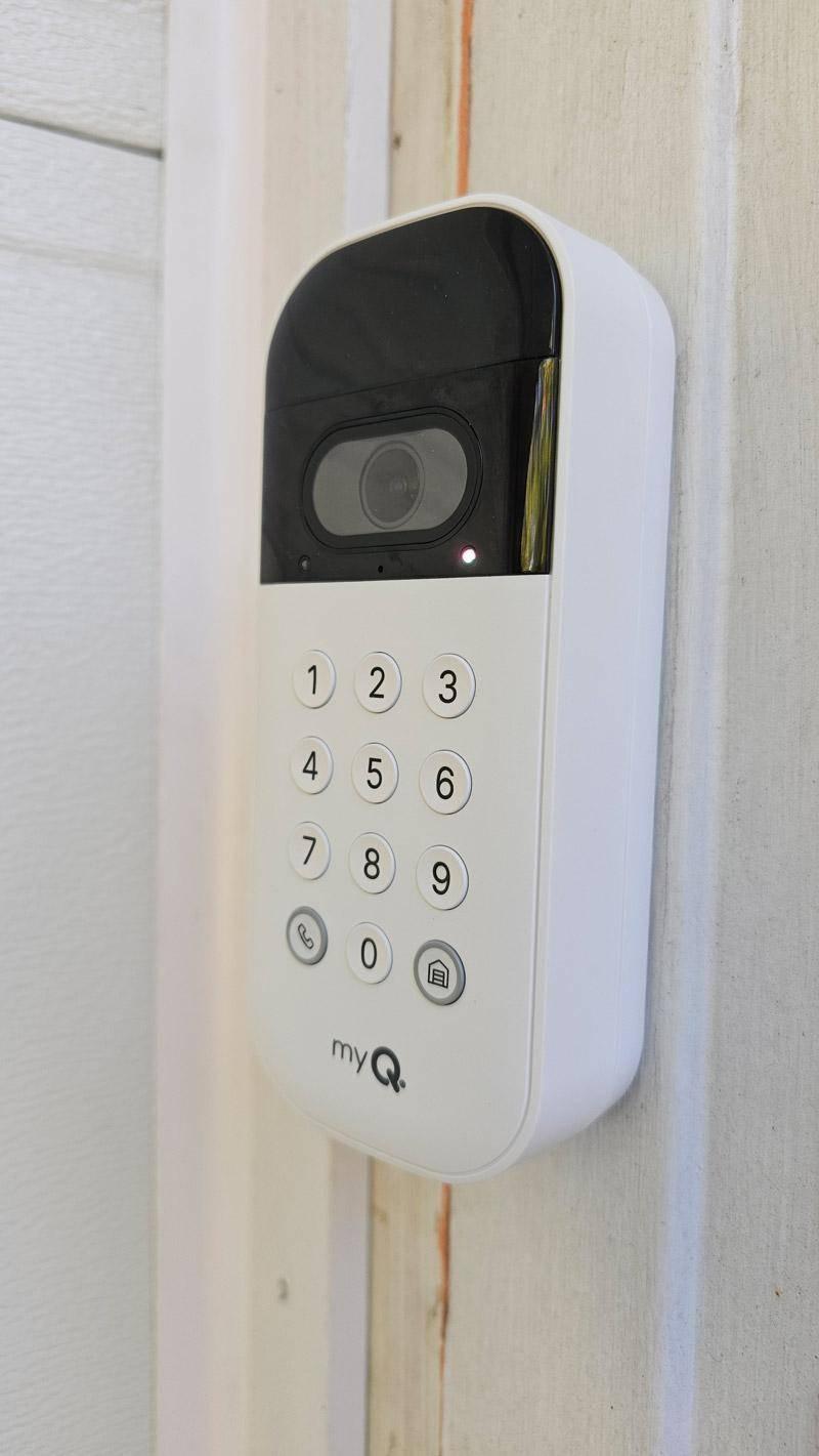 myq garage camera keypad mounted on door