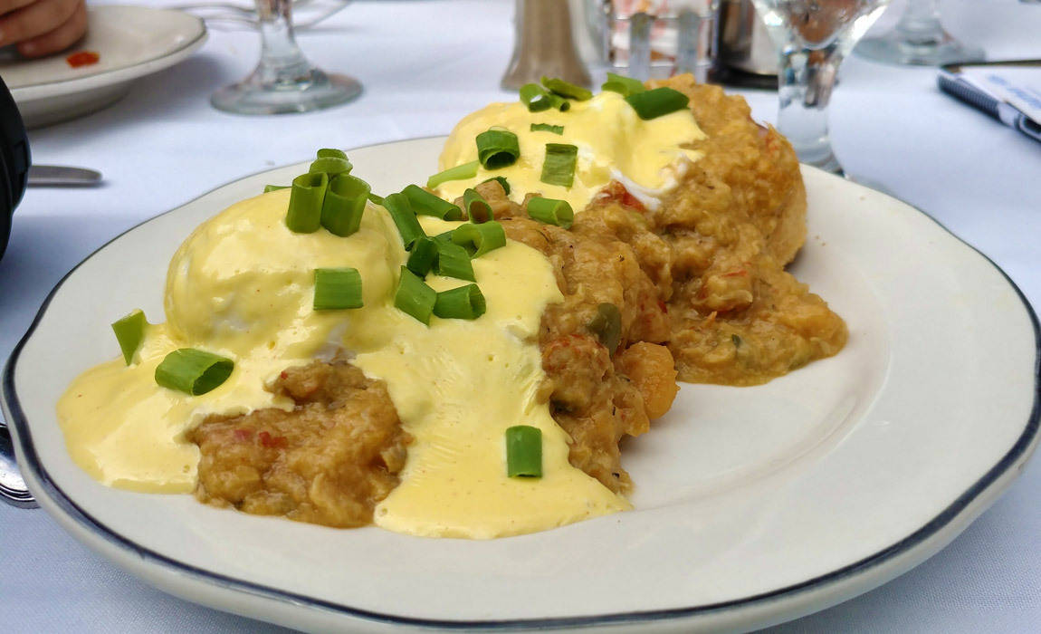 crawfish etoufe benedicts at court of two sisters in new olreans' French Quarter