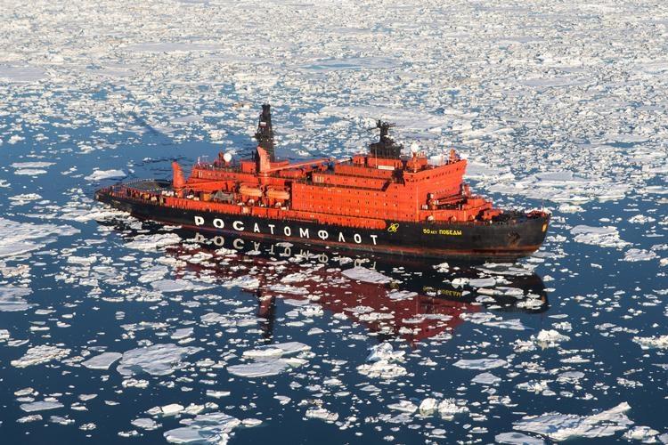 ice breaker surrounded by icebergs