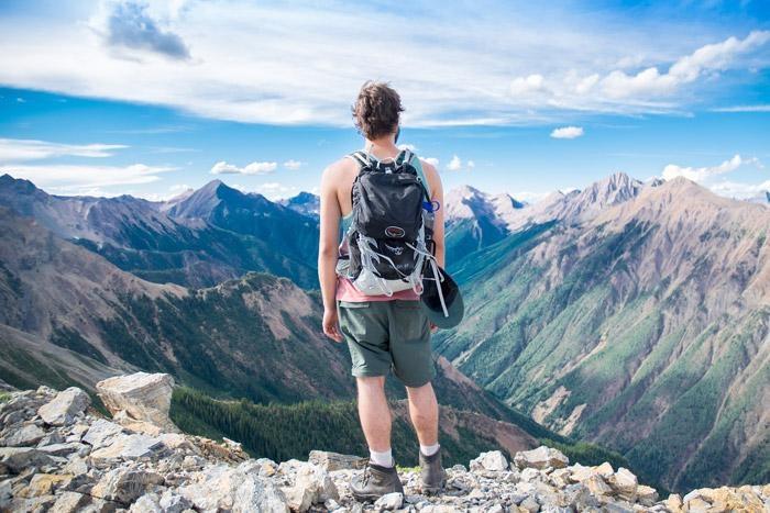 backpacking in mountains on mancation adventure