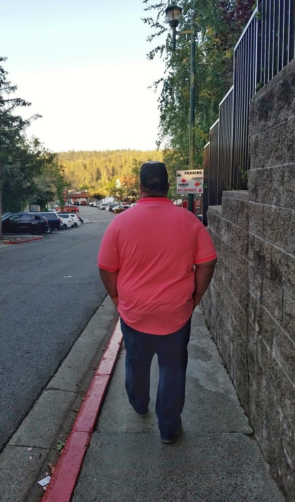 james walking down street in psycho bunny polo