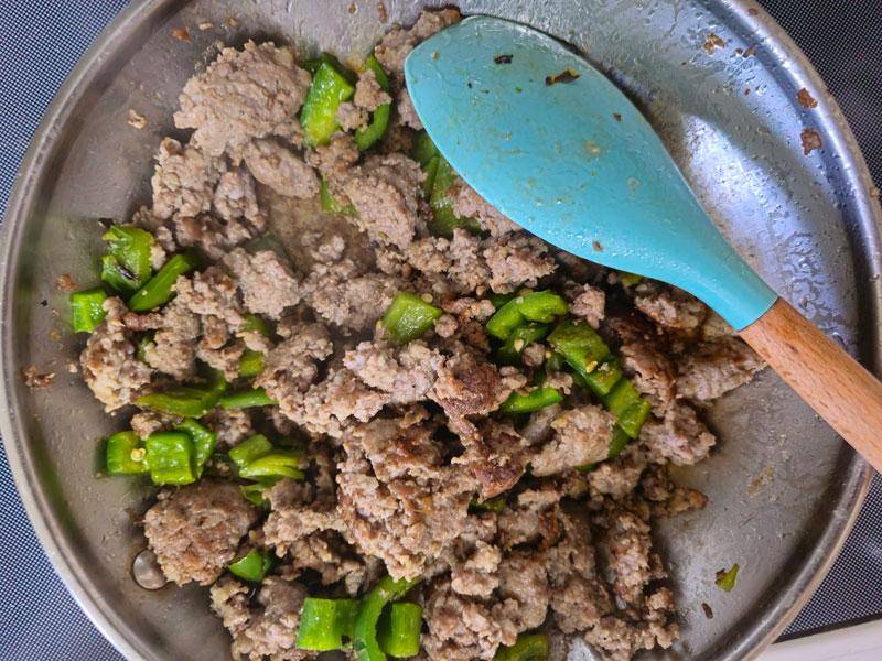 sausage and peppers in pan