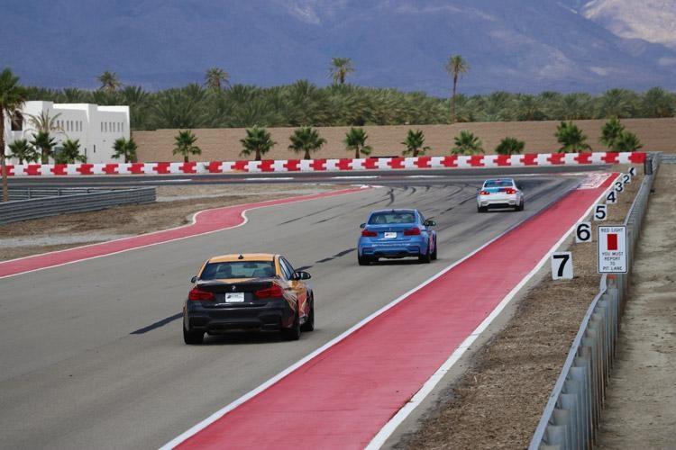 bmw performance center racing on the track at thermal club palm springs california