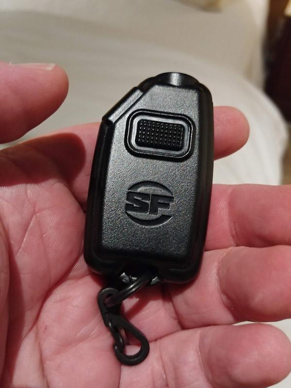 surefire sidekick flashlight in hand