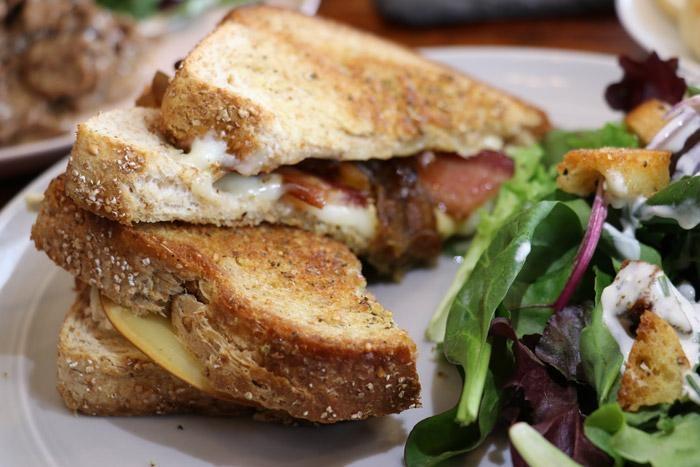 cheese mongers grilled cheese cheddar brie smoked gouda herbed butter crust on sourdough