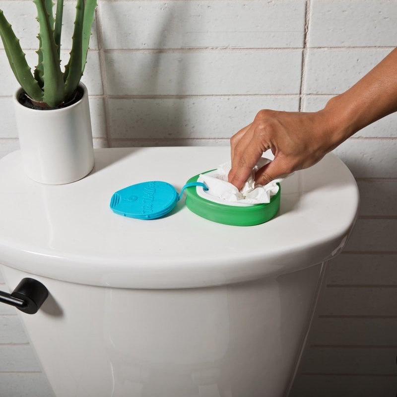 The UnWipe silicone device open showing textured mesh surface