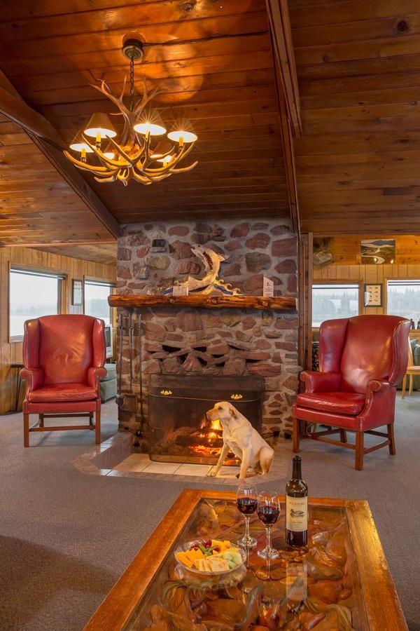 tikchik narrows lodge main cabin fireplace