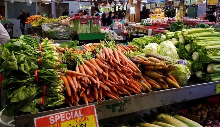 buying vegetables at a farmers market