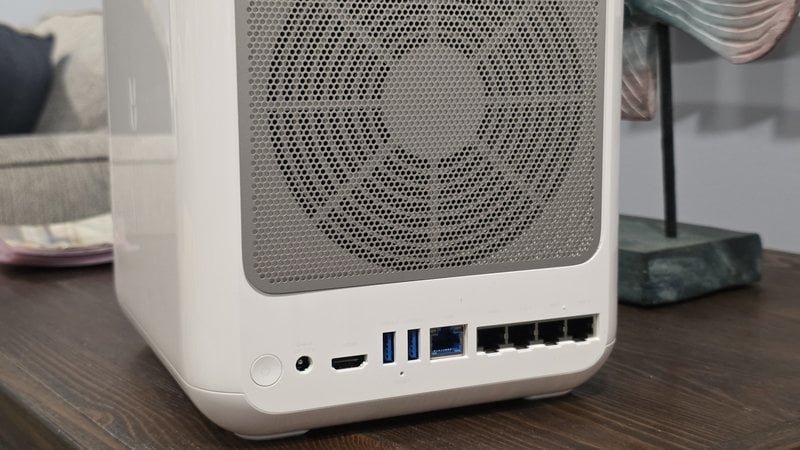 Rear panel of the UGREEN HomeAgent HA100 showing HDMI, two USB-A ports, a 2.5GbE port and four PoE camera ports