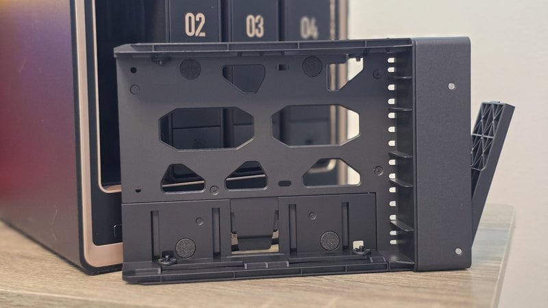 Drive tray removed from the UGREEN NASync DXP4800 GT in front of bays 02, 03 and 04