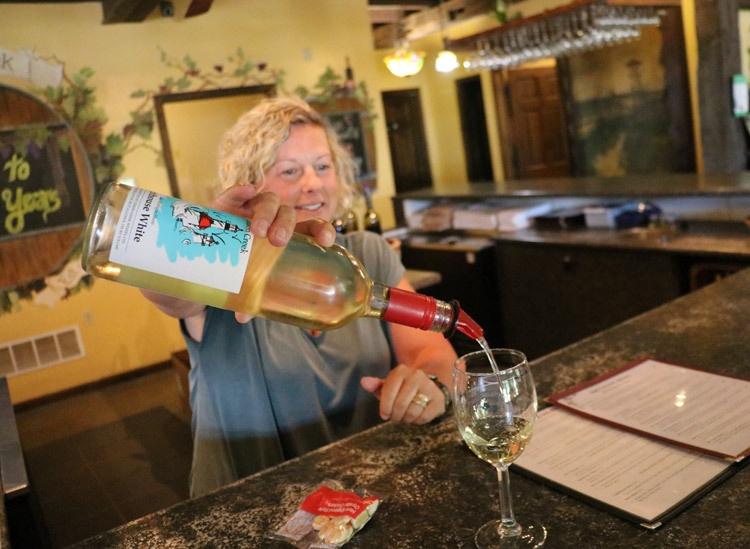 lighthouse white wine at lemon creek vineyard lake michigan shore wine country
