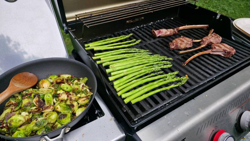 Venison Tomahawk Steaks with Blueberry Compote on grill