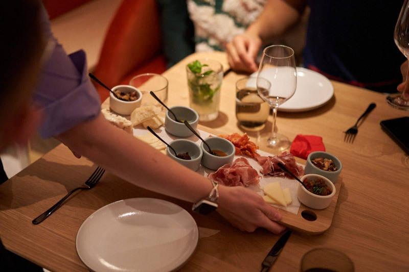charcuterie board at extra virgin virgin voyages scarlet lady cruise ship food