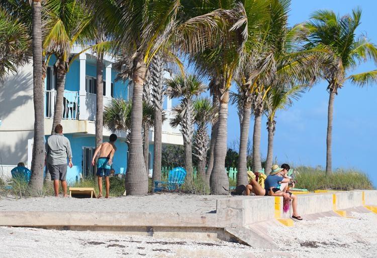playing corn hole wannab inn manasota key florida beachfront resort