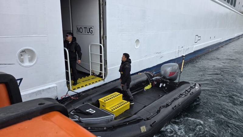 getting on to a zodiac boat