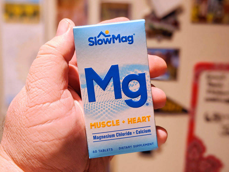 slow mg box in hand