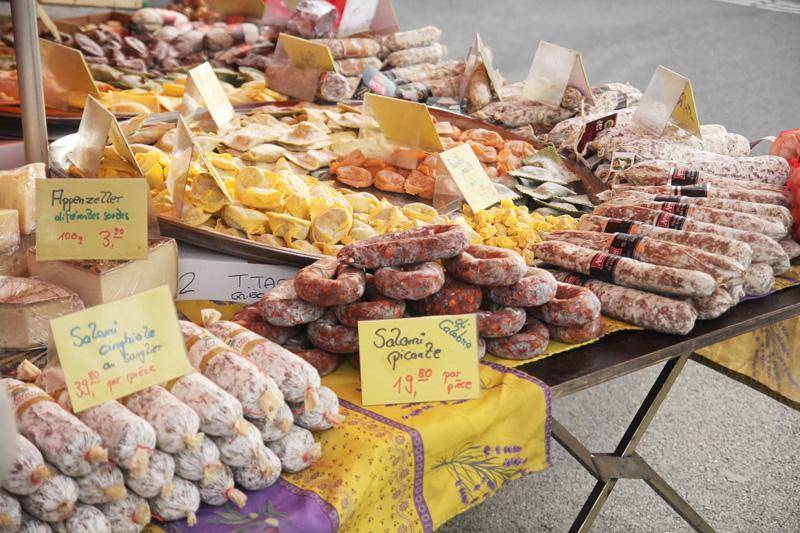 sausages at a swiss farmers market in geneva switzerland