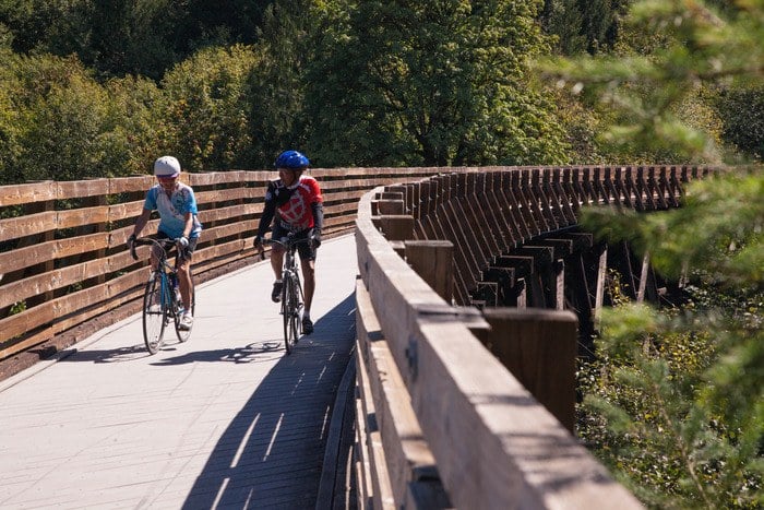 Cyclists on the Banks-Vernonia State Trail trestle in Tualatin Valley, Oregon (photo credit: Explore Tualatin Valley)