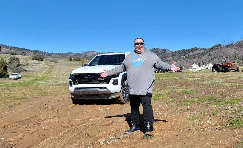 james with muddy boots and truck