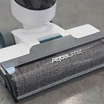 Kenmore AquaLite 3-in-1 cordless wet dry vacuum brushroll close-up on concrete floor