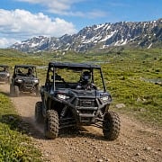 Guided Polaris side-by-sides on an alpine tundra trail at Hatcher Pass, Alaska
