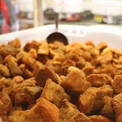 Cracklins are just one of the man-friendly foods you'll need to try when visiting Lafayette, Louisiana on a guys weekend.