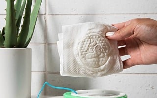 The UnWipe portable toilet paper enhancement device for travel