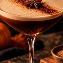 Espresso Pumptini fall coffee cocktail with star anise, pumpkins, and baking spices