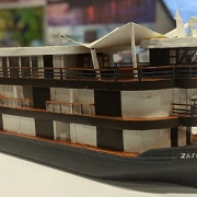 Scale model of the Zafiro Amazon riverboat on display at a travel trade show