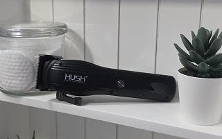 The HUSH Pro Clipper on a bathroom shelf